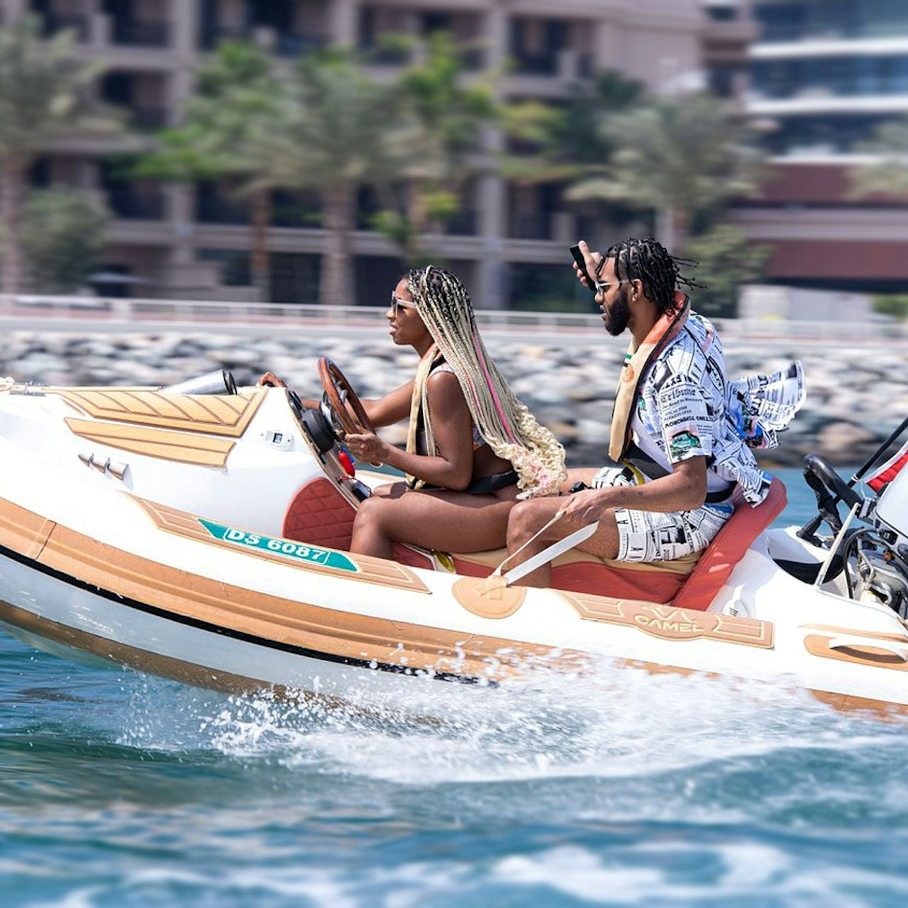 Experience the excitement of self-driving a speedboat as you explore Dubai's stunning coastline revealing iconic landmarks like the Burj Al Arab and Palm Jumeirah. Adventure awaits on the water!